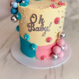 Luxury Buttercream Baby Shower Cake with Pink & Blue Accents