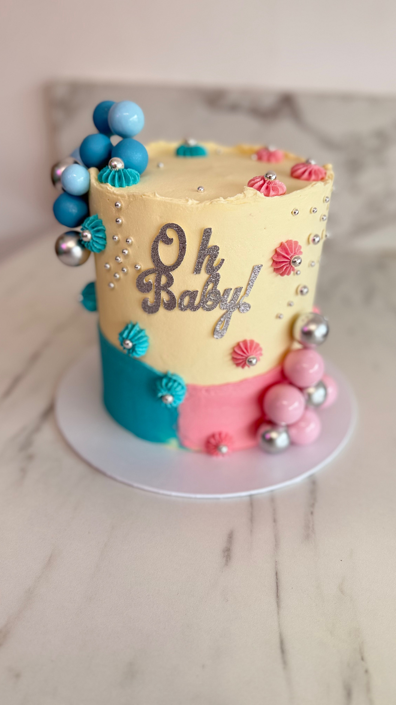 Luxury Buttercream Baby Shower Cake with Pink & Blue Accents