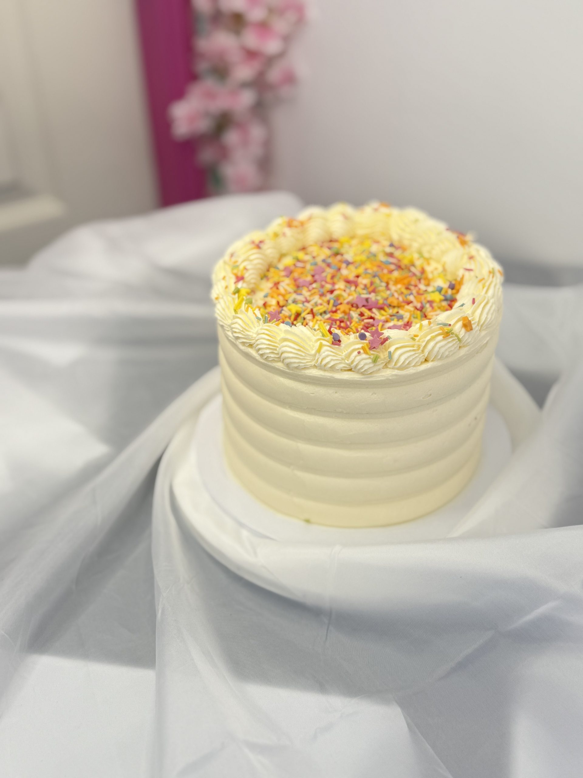 Classic Vanilla Buttercream Cake with Rainbow Sprinkles - Image 3