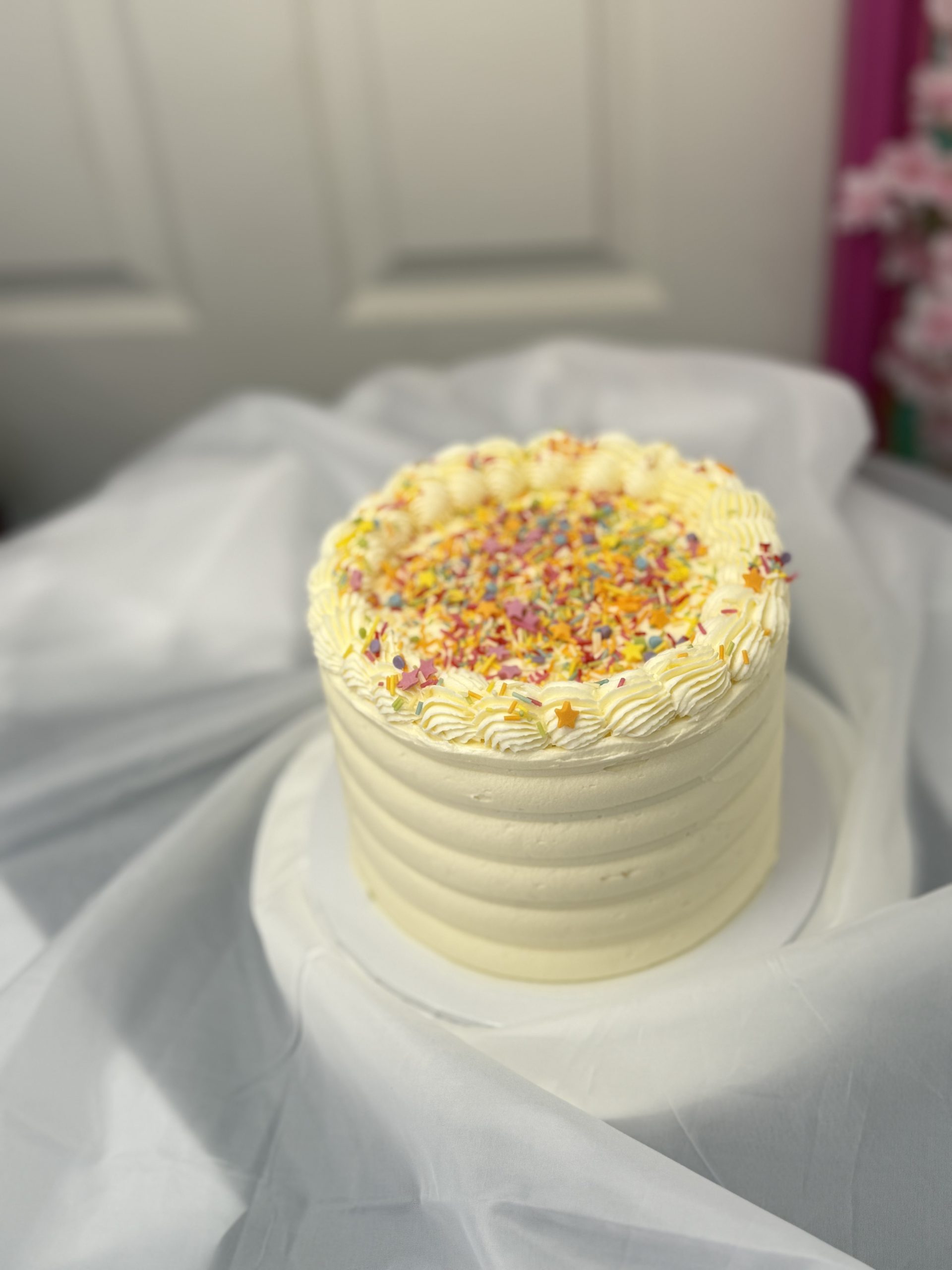 Classic Vanilla Buttercream Cake with Rainbow Sprinkles - Image 2