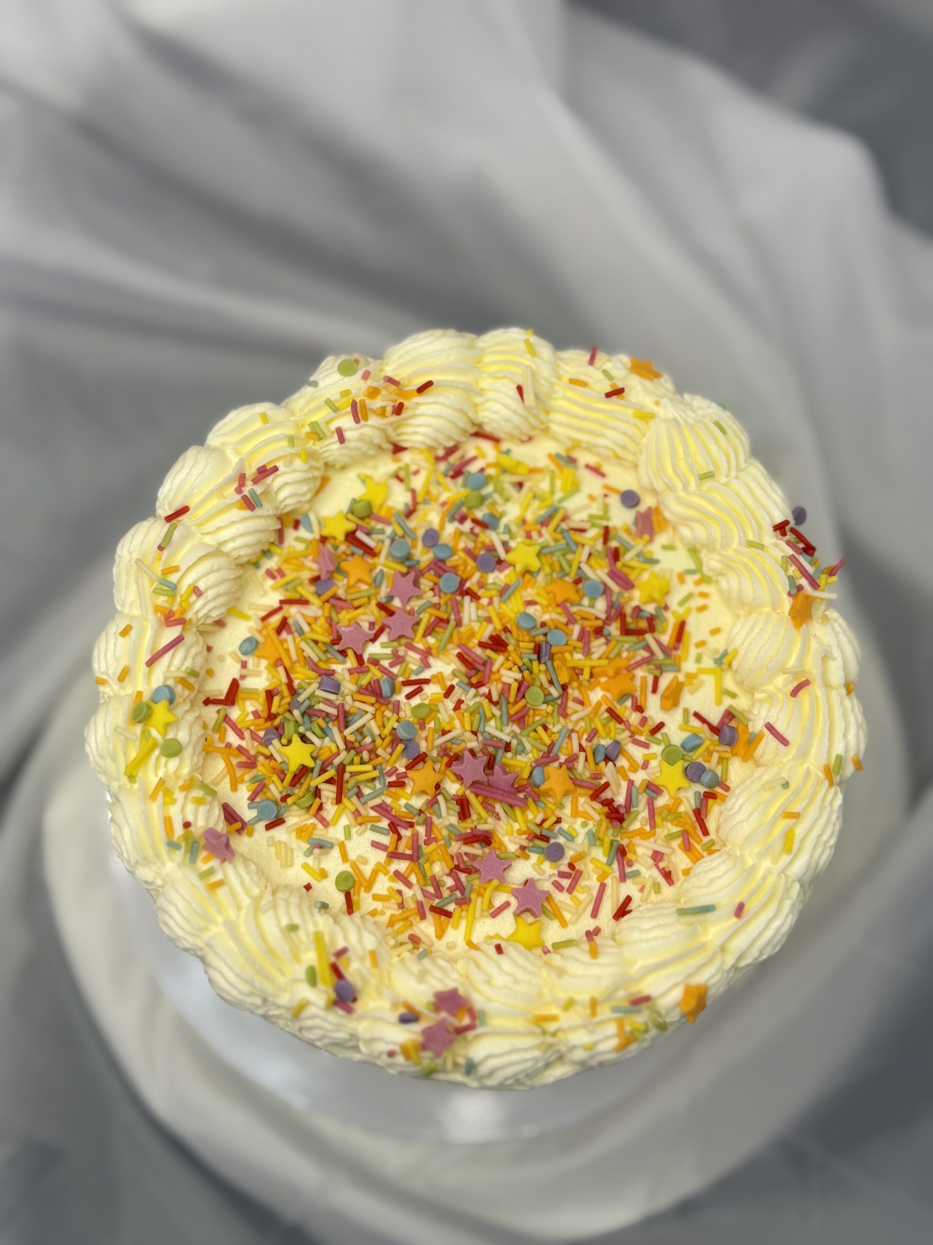 Classic Vanilla Buttercream Cake with Rainbow Sprinkles