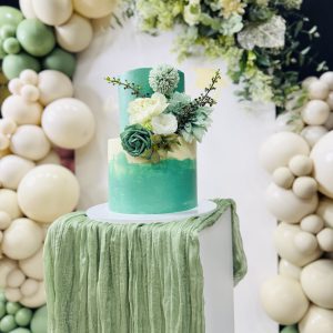 The Boho-Chic Two-Tier Sage Green Floral Cake